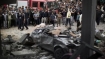 The wreckage of a car is seen at the site of an Israeli airstrike in Gaza City, November 17, 2012.