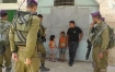 Israeli soldiers prepare to arrest a 5-year old boy