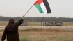 Palestinian woman and Israeli forces