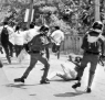 Police clash with university students in Jaffna on November 28.