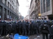 Riot police kettle protesters at the Camp for Climate action, part of the 2009 G-20 London summit protests