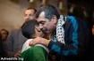 Freed Palestinian prisoner Khaled Al-Azraq greets a young family member