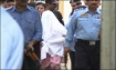 Rimsha being escorted to court