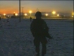 Soldier with a setting Afghan sun - by: Tim King 