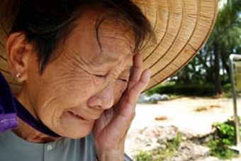 A photo by Murayama of Truong Thi Le, who was one of only three members of her family to survive the My Lai massacre by the Americans in 1968