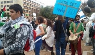 Thousands of Israelis march for human rights in Tel Aviv, 10 December 2011.