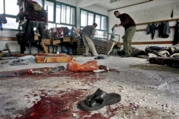 Bloodsoaked carpets in a classroom at a UN school that was targeted and attacked by Israelis