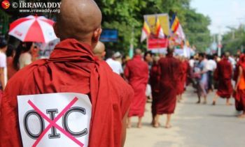 A Buddhist monk wearing an anti-OIC sign marches in Pakokku, Sagaing Division, on Monday, Oct. 15, 2012. (Photo: The Irrawaddy)