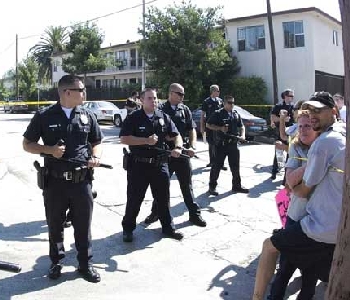 Medical marijuana protesters met in front of the Governor's Los Angeles Headquarters to throw a spotlight on DEA raids