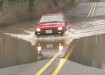 car driving in flood