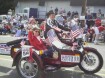 John Strauch and Marion County Commissioner Patti Milne in a Russian Ural motorcycle, complete with sidecar