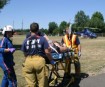 Motorcycle rider on stretcher, lifeflight helicopter