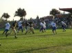 police playing football in Oregon Pigbowl