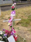 This cross and others were erected near the scene of two local train fatalities during the summer of 2004